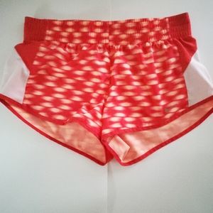 Nike Dri-Fit women's S running shorts, red, coral & white pattern